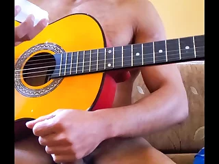 Latin American hunk strums and strokes